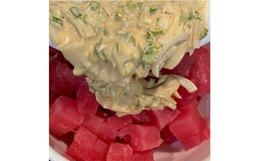 Pour the mixture over the ahi.