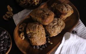 pastries on a wooden tray.