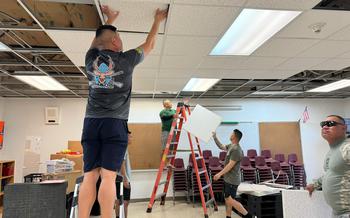 Soldiers from the Guam National Guard’s Bravo Company, 1-294th Infantry Regiment (Chamorri Battalion), now activated as Team Binadu under Task Force Talon, help Adacao Elementary School prepare for inspection Feb. 7, 2023. Capt. Team Binadu looks to perform as much community service as possible while mobilized to secure Guam’s Terminal High Altitude Area Defense (THAAD).