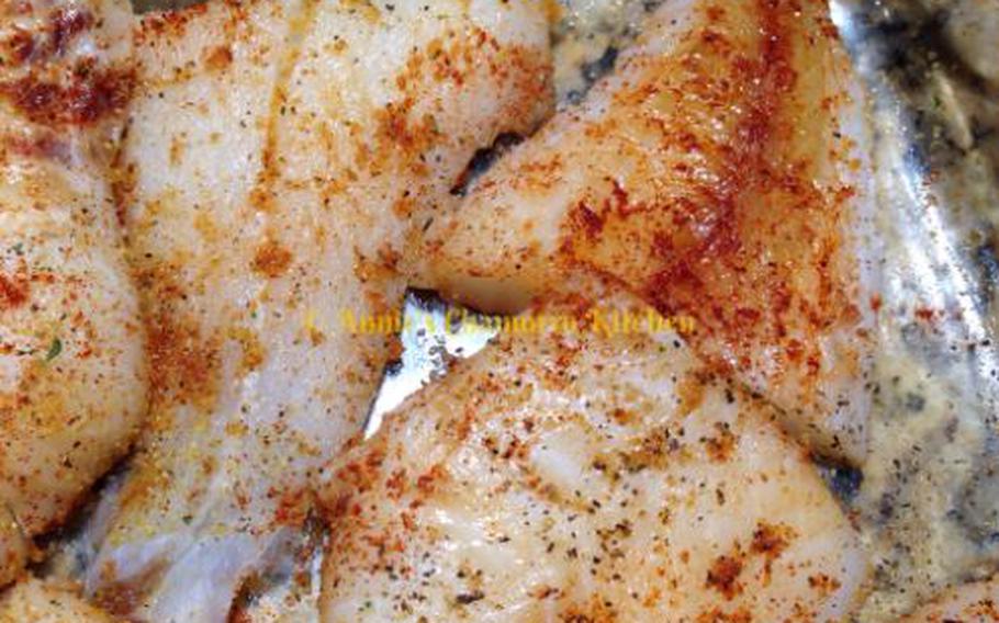 Cut the fish filets into halves (if they’re small) or thirds (if they’re large).
Place into a rimmed baking dish (I used a 9×13 pan). Sprinkle both sides of the fish with the sea salt, black pepper, garlic powder and paprika.