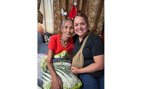 Photo Of U.S. Master Sgt. Misty Palomo and her aunt pose for a photo.