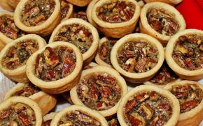 Pecan tassies on a plate.