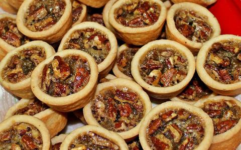 Photo Of Pecan tassies on a plate.