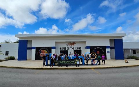 Photo Of Dusit Guam and iLearn Academy staff at the iLearn Academy elementary school campus.