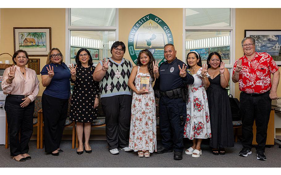 Julie Ann L. Laxamana, a senior Criminal Justice and Biology major at the University of Guam, has been selected for the 2024 Truman Scholarship. From left to right: Dr. Gena Rojas, Interim Dean of Enrollment Management and Student Succes and eleventh UOG Truman Scholar; Dr. Sharlene Santos-Bamba, Senior Vice President and Provost; Dr. Anita Borja Enriquez, UOG President; Christian Gyles Ramos, UOG student and 20th UOG Truman Scholar; Julie Ann L. Laxamana; Julian Laxamana, Jr.; Junellie Mae Laxamana; Mae Anne Laxamana; and Dr. Ronald McNinch, Associate Professor of Public Administration.