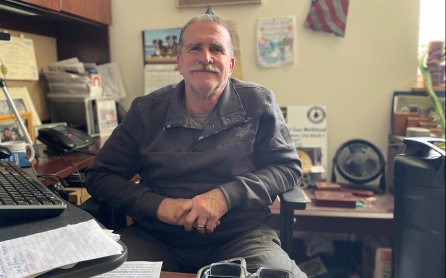 R.J. Dyrdek, Energy Program manager at Fort Knox Directorate of Public Works, sits at his desk Feb. 20, 2024. He is often considered a walking miracle by friends and family members after surviving a widowmaker heart attack in 2015. 