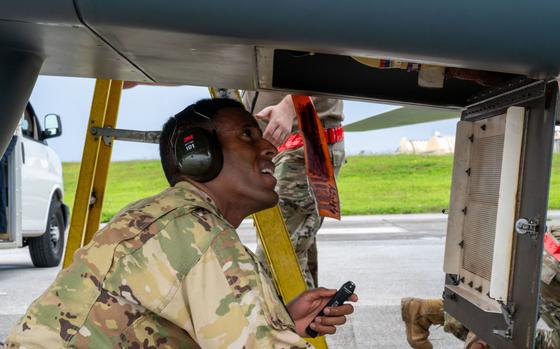 Photo Of U.S. Air Force 1st Lt. William Harris, 4th Reconnaissance Squadron RQ-4B Global Hawk Pilot, checks for leaks during his aircraft walk-around on Andersen Air Force Base, Guam, Sept. 17, 2024. The RQ-4B is thoroughly inspected before and after each flight, with several members performing routine maintenance checks to ensure capability and safety.