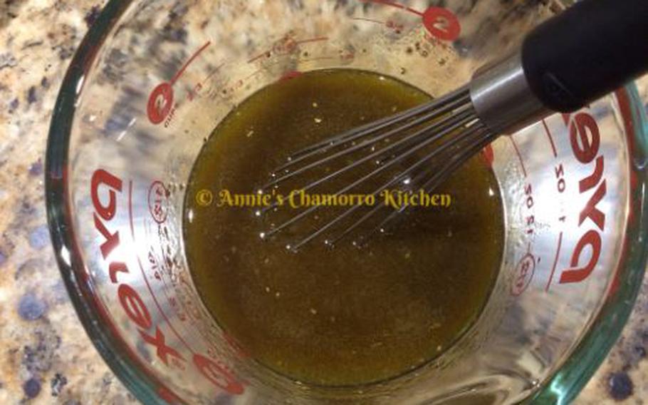 In a small mixing bowl, whisk together the ingredients for the dressing.