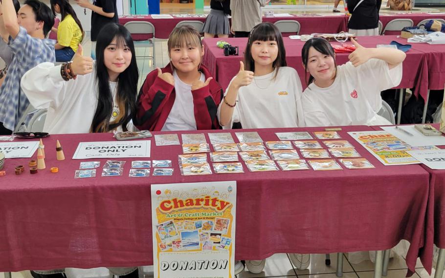 Students from the Niigata College of Art and Design display their craft and art pieces for sale at the annual Charity Art and Craft Market benefitting UOG’s Fine Arts program.