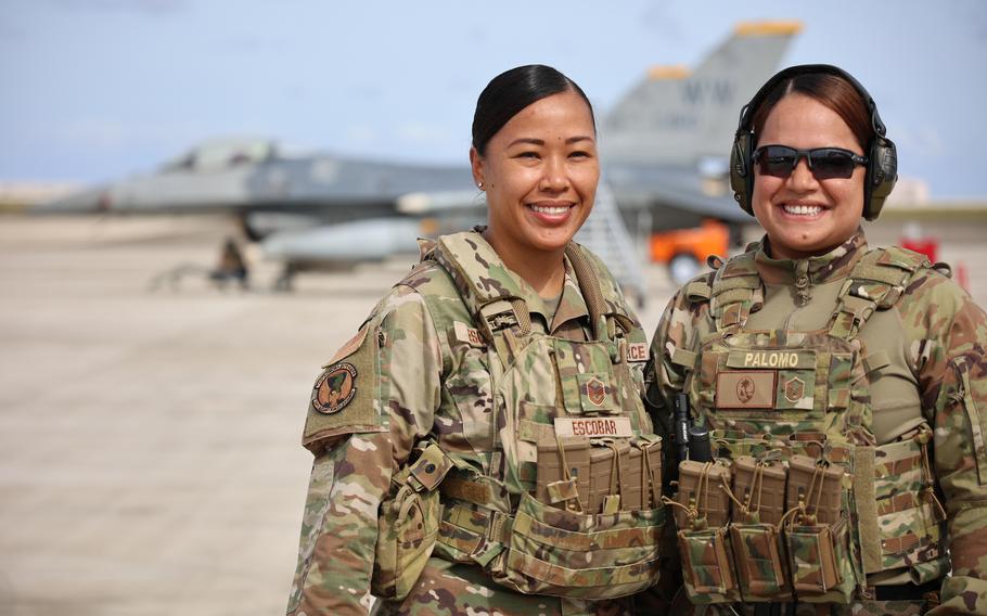 U.S. Air Force Master Sgts. Jordanna Escobar, left, and Misty Palomo of the Guam Air National Guard 254th Security Forces Squadron, pull security on a U.S. Air Force F-16 Fighting Falcon at the A.B. Won Pat Guam International Airport during Exercise Cope North, Feb. 9, 2024.