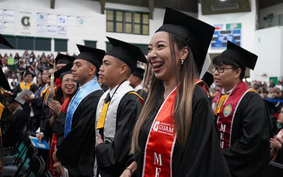 Business administration major Seira Cruz gets ready to walk across the stage at the University of Guam Fanuchånan 2024 Commencement Ceremony on Dec. 15 in the Calvo Field House.