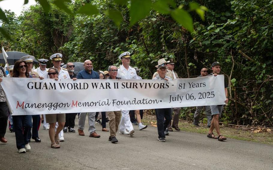 U.S. service members, Guam residents, and supporters participate in a march to the Mañenggon Memorial Ceremony.