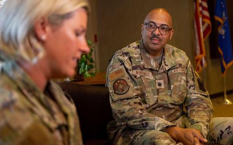 Photo Of U.S. Air National Guard Chaplain Derick Wakefield speaks with an airman about suicide prevention at the I.G. Brown Training and Education Center on McGhee Tyson Air National Guard Base, Tennessee, on Aug. 27, 2023.