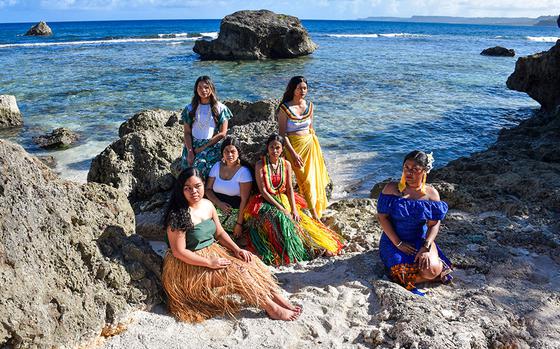 Photo Of Six students are on the beach.