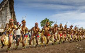 men’s group are dancing.