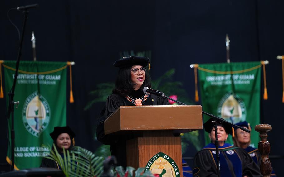 UOG President Anita Borja Enriquez addresses the graduating class of Fanuchånan 2024 on Dec. 15 in the Calvo Field House.