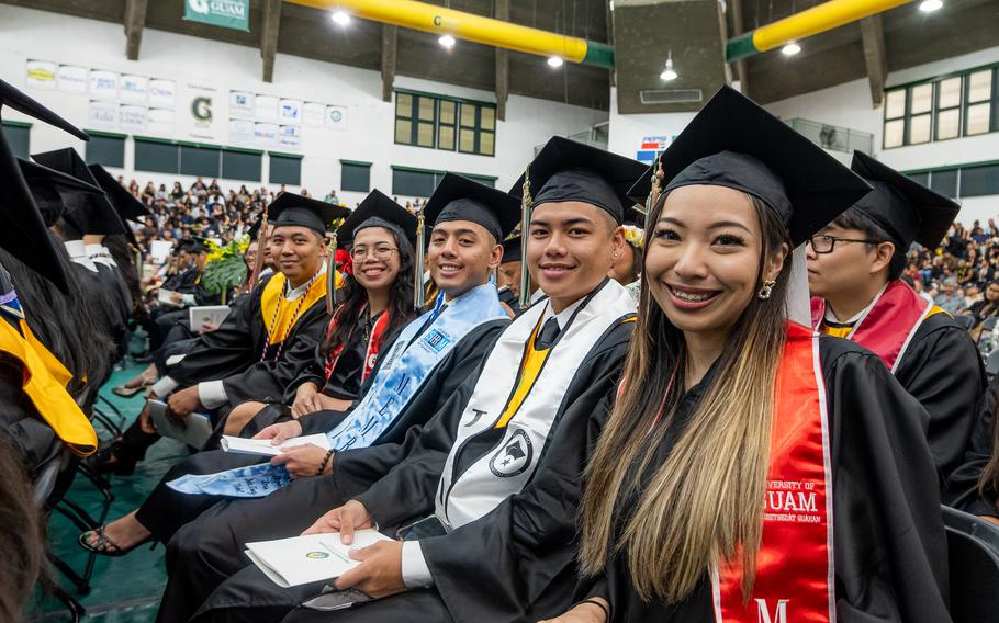 Graduates pose for a photo at the University of Guam Fanuchånan (Fall) 2024 Commencement Ceremony last December at the UOG Calvo Field House.  