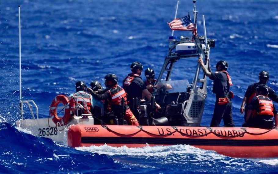 The crew of USCGC Oliver Henry (WPC 1140), having rescued three mariners stranded on Pikelot Atoll, Yap State, Federated States of Micronesia, prepare the cutter boat and the marienrs to be recovered to the cutter for further transport to Polowat Atoll, Chuuk State, on April 9, 2024. Watchstanders at Joint Rescue Sub-Center Guam received a distress call from a relative of the three mariners on April 6, 2024, reporting her three uncles departed Polowat Atoll Easter Sunday for Pikelot Atoll, approximately 100 nautical miles northwest and had not returned, prompting the search. 