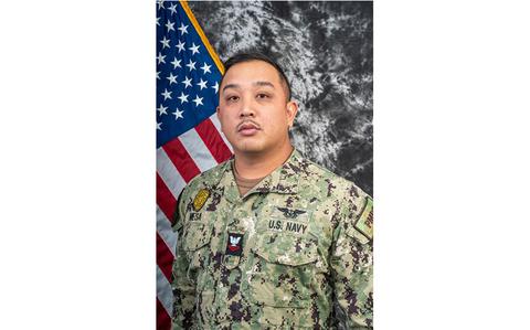 Photo Of U.S. Navy Petty Officer 2nd Class George Anthony Mesa poses.