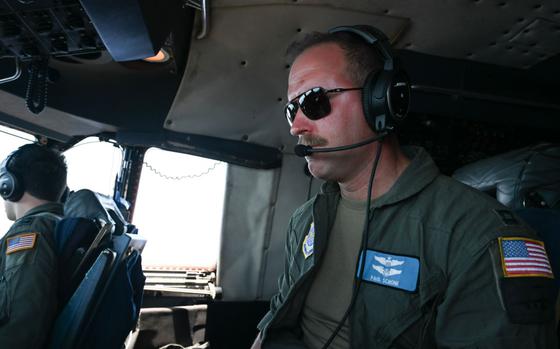 U.S. Air Force Capt. Paul Schone, 436th Airlift Wing Lockheed C-5M Super Galaxy pilot, helps navigate the C-5 to Saipan International Airport over the Pacific Ocean, May 1, 2025. The aircraft carried an R-11 truck to be unloaded for wet-wing defueling. 