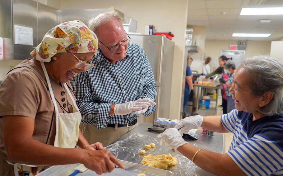 participants are smilingly making whole-wheat rosketti.