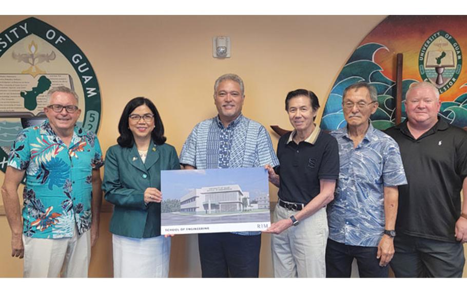 Dean Brennon Morioka, of the University of Hawaiʻi at Mānoa’s College of Engineering, center, and Dr. Marvin Young, Professor in UH Mānoa’s Department of Mechanical Engineering, fourth from left, meet with Dr. Anita Borja Enriquez, President of the University of Guam, and others in September 2022 to kick off their partnership that also includes the Pearl Harbor Naval Shipyard.  