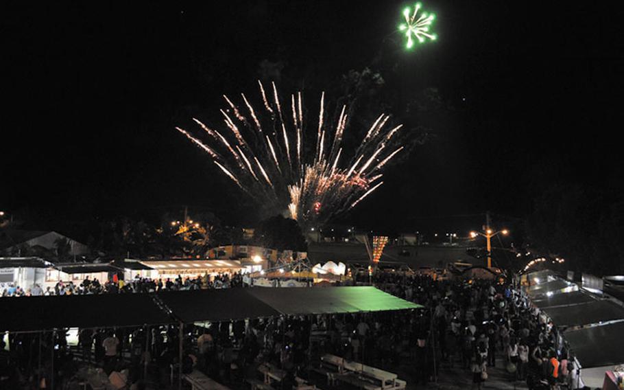 Fireworks are displayed at night.