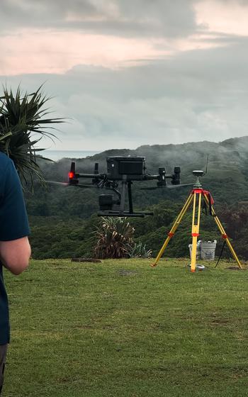 A DJI M350 RTKdrone equipped with a LiDAR sensor flies over Aimeliik state.