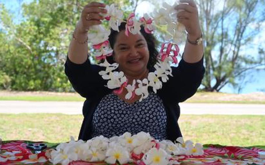 Eleanor Mesa smiles with a lei.
