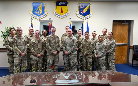 Photo Of Team Andersen leadership come together to congratulate new Chief Master Sgt. selects.