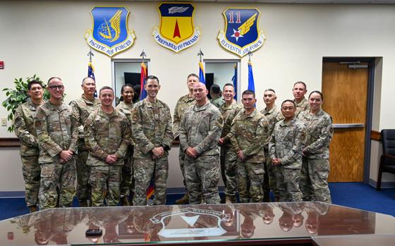 Team Andersen leadership come together to congratulate new Chief Master Sgt. selects.