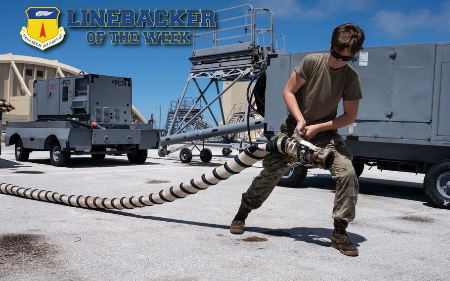 U.S. Air Force Airman 1st Class Vanessa Kernan, an aerospace ground equipment journeyman with the 36th Maintenance Group, drags out the hose of a trailer mounted gas turbine compressor at Andersen Air Force Base, Guam, March 8, 2022. The Team Andersen Linebacker of the Week recognizes outstanding enlisted, officer, civilian and total force personnel who have had an impact on achieving Team Andersen’s Mission, Vision and Priorities. (U.S. Air Force photo illustration by Airman 1st Class Kaitlyn Preston)