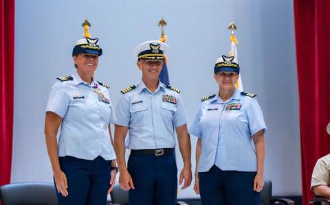 Photo Of Cmdr. Abigail Clark (right) assumes command of U.S. Coast Guard Base Guam from Cmdr. Dana Hiatt (left) in a change of command ceremony at the Naval Base Guam Theater in Santa Rita, Guam.