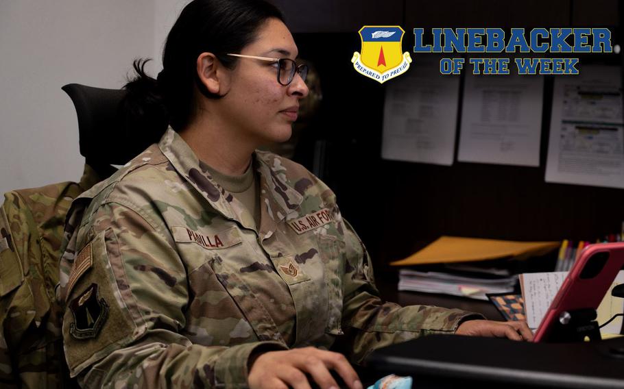 U.S. Air Force Tech. Sgt. Zarah Padilla, the commander’s executive assistant assigned to the 36th Contingency Response Group, works at her desk at Andersen Air Force Base, Guam, Jan. 18, 2023. The Team Andersen Linebacker of the Week recognizes outstanding enlisted, officer, civilian and total force personnel who have had an impact on achieving Team Andersen’s mission, vision and priorities. (U.S. Air Force photo illustration by Airman 1st Class Emily Saxton)