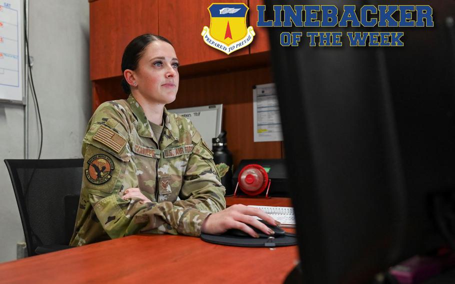 U.S. Air Force Staff Sgt. Jordan Tschoepe, the unit deployment manager assigned to the 736th Security Forces Squadron, works at her computer at Andersen Air Force Base, Guam, Oct. 20, 2022. Tschoepe acts as liaison for the unit commander ensuring all personnel and cargo meet deployment readiness preparation for international requirements. (U.S. Air Force photo illustration by Airman 1st Class Breanna Christopher Volkmar)