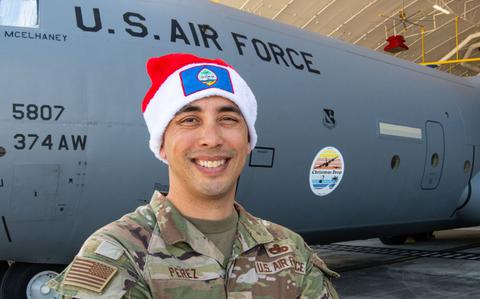 Photo Of U.S. Air Force Lt. Col. Martin Perez, deputy commander of the 374th Maintenance Group at Yokota Air Base, Japan, stands on the flightline at Andersen Air Force Base, Guam, Dec. 9, 2024.