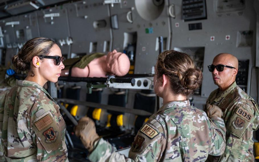 U.S. Air Force 1st Lt. Courtney Kalb, 624th Aerospace Medicine Flight, Clinical Nurse gives instructions on how members should load simulated patients onto stantions on Andersen Air Force Base, Guam, Sep. 06, 2024. 