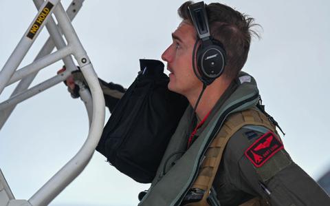 Photo Of U.S. Air Force Capt. Chase Loving, 34th Expeditionary Bomb Squadron pilot, enters a B-1B Lancer assigned the the 34th EBS prior to a mission in support of Bomber Task Force 25-1, at Andersen Air Force Base.