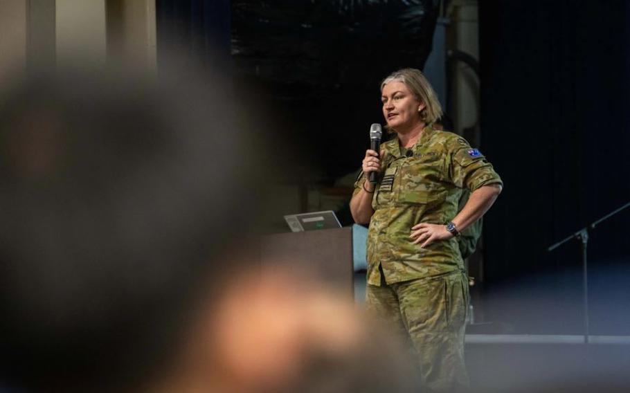 Royal Australian Air Force Group Captain Kylie Green, Task Group commander, discusses expectations of Cope North 24 with participants at Anderson Air Force Base, Guam, Feb. 5, 2024.