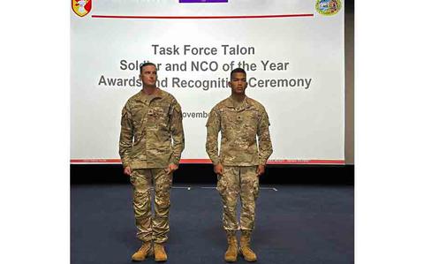 Photo Of Sgt. Michail Fitch (left) and Spc. Manuel Quenga were recognized as the Task Force Talon NCO and Soldier of the Year.