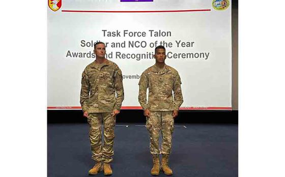 Sgt. Michail Fitch (left) and Spc. Manuel Quenga were recognized as the Task Force Talon NCO and Soldier of the Year.