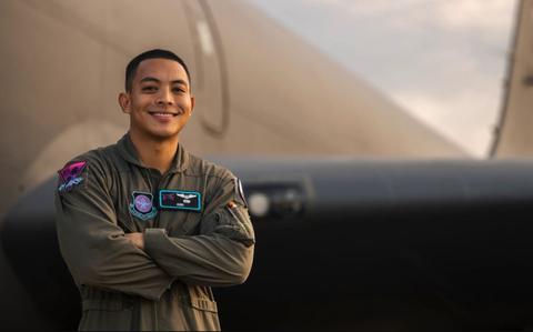 Photo Of U.S. Air Force Staff. Sgt. Alex Diego, a boom operator assigned to the 91st Air Refueling Squadron, poses for a photo near a KC-135 Stratotanker at MacDill Air Force Base.