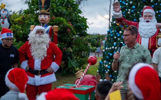 U.S. Air Force Brig. Gen. Thomas Palenske, commander of the 36th Wing, speaks at the Tree Lighting Ceremony at Andersen Air Force Base, Guam.