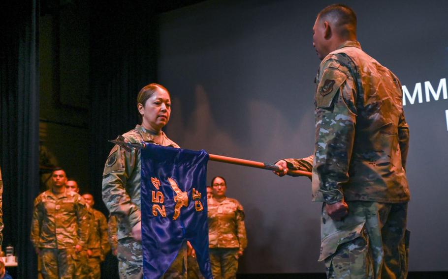 U.S. Air Force Col. Veronica Reyes, 254th Air Base Group commander, Guam Air National Guard, prepares to appoint Capt. Tommy Joe Rivera as the commander of the 254th Communications Flight (CF) during a ceremony on Andersen Air Force Base, Guam, June 7, 2025. The newly established 254 CF comes at a time of growing cyber threats and heightened strategic focus in the Indo-Pacific region.