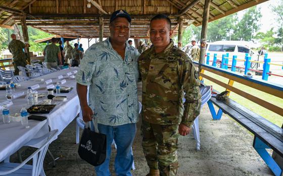 Photo Of U.S. Army Col. Manny Duenas, Guam National Guard State Partnership Program director, poses with Governor Emais Roberts, Peleliu state government, at the Peleliu South Dock, Republic of Palau, Sept. 17, 2024. 