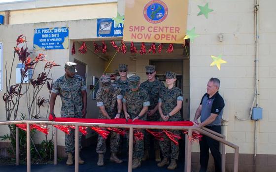 U.S. Marines with Marine Corps Base Camp Blaz, hold a ribbon cutting ceremony for the grand opening of the new Single Marine Program center on MCB Camp Blaz, Guam, Jan. 31, 2025.