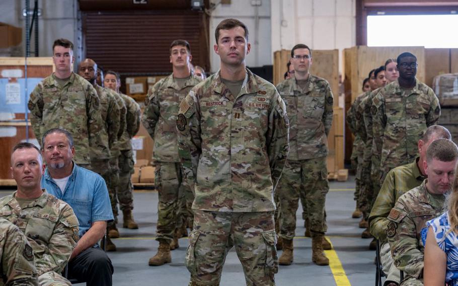 Capt. Nicholas Westrick, 734th AMS Maintenance director of operations, leads a flight of Airmen during a change of command ceremony at Andersen Air Force Base, Guam.