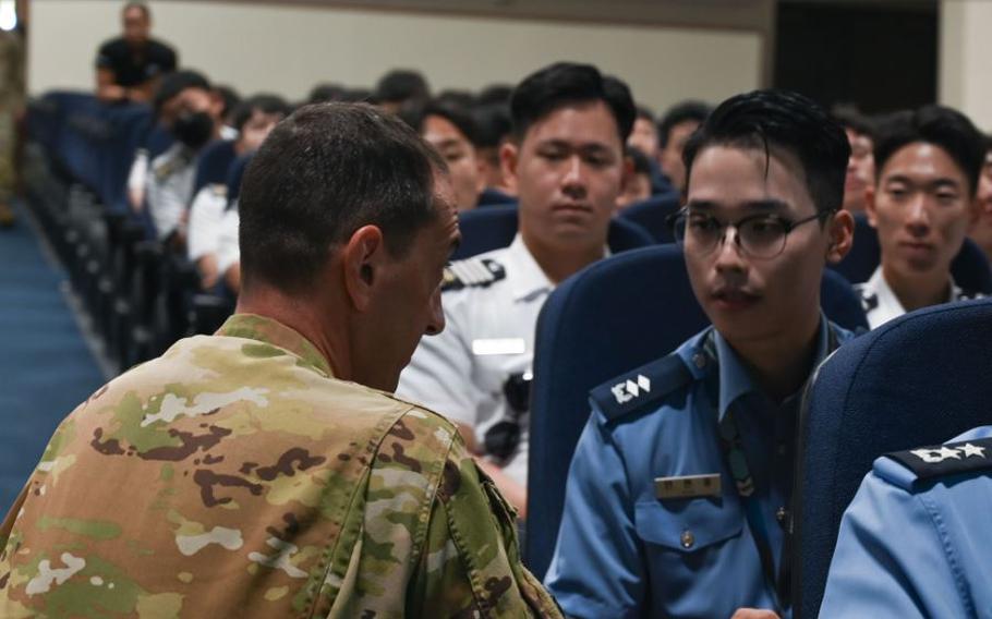 Master Sgt. Marvin Rottenberg, 36th Wing Plans Programs and Readiness superintendent, answers a question from a Republic of Korea Air Force member at Andersen Air Force Base, Guam, September 4, 2024.