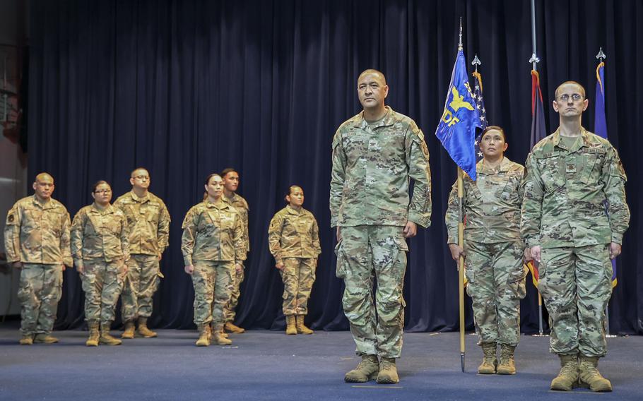 U.S. Air Force Col. Anthony Lujan, center, commander of the Guam Air National Guard 254th Air Base Group, presides over the activation ceremony of the 254th Medical Flight, Guam.