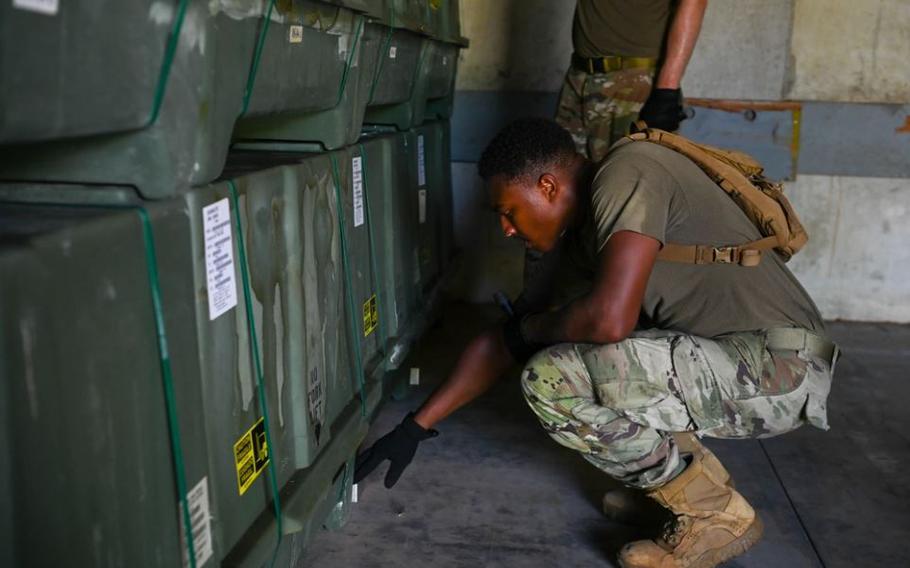 U.S. Air Force Senior Airman Davin Willingham, maintenance crew chief with the 36th Munitions Squadron, reads off munition inventory information at Andersen Air Force Base Guam, Nov. 7, 2023. During this comprehensive process, the 36 MUNS team is responsible for meticulously recording every munition present on the base. Photo by Senior Airman Allison Martin